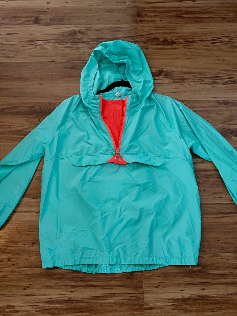 Women’s Under Armour sea foam green and orange quarter zip windbreaker